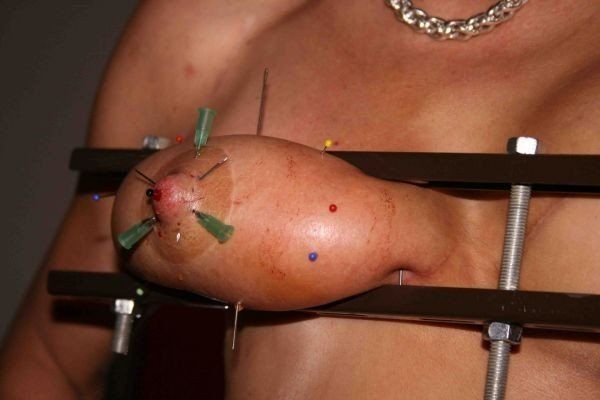 Needles torture tits
