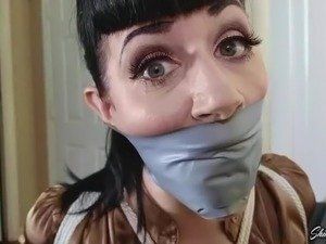 Girl duct tape gagged