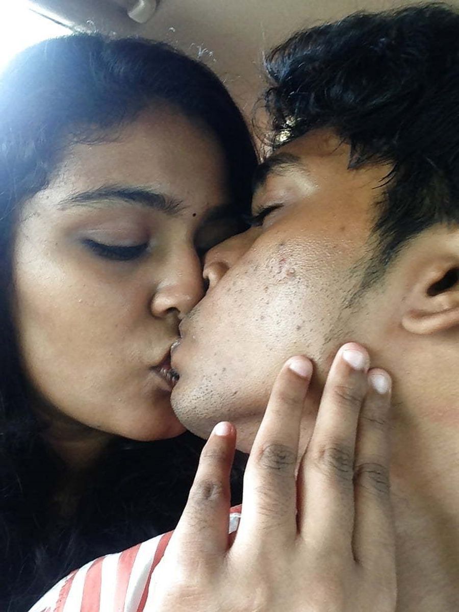 Indian kissing romantic couple